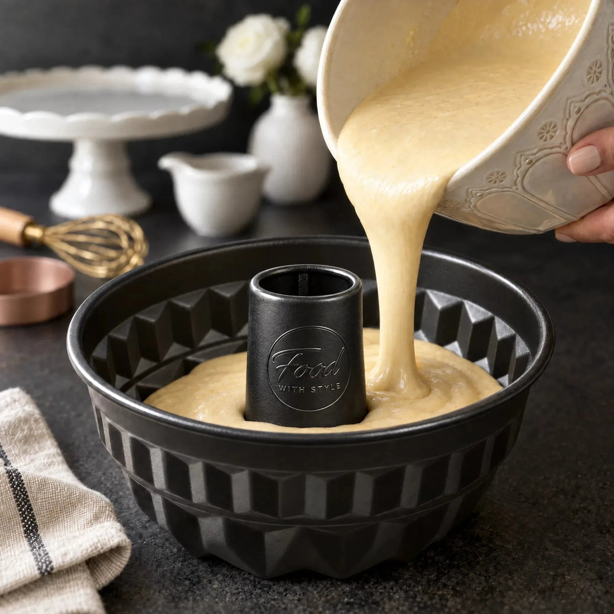 Cake batter being poured into the Food with Style ring cake pan 16 cm